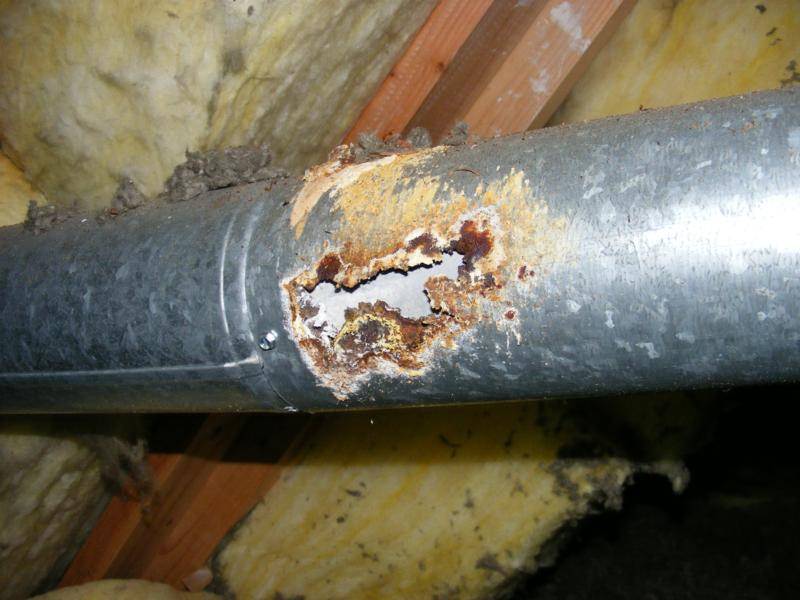 Badly corroded vent pipe