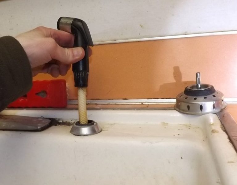 leak under kitchen sink sprayer